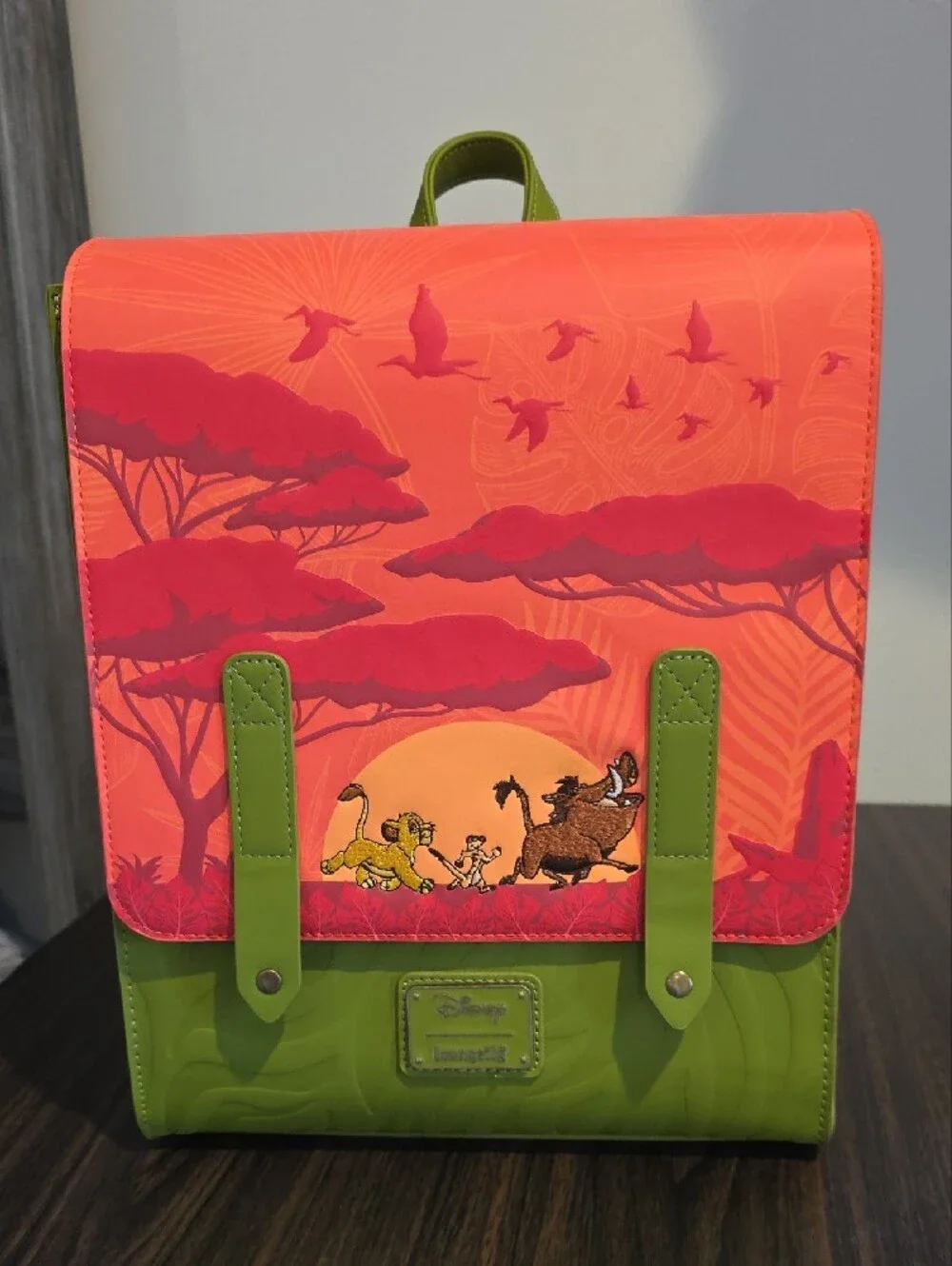 Loungefly Disney Lion King Orange and Green Backpack with Sunset Graphic